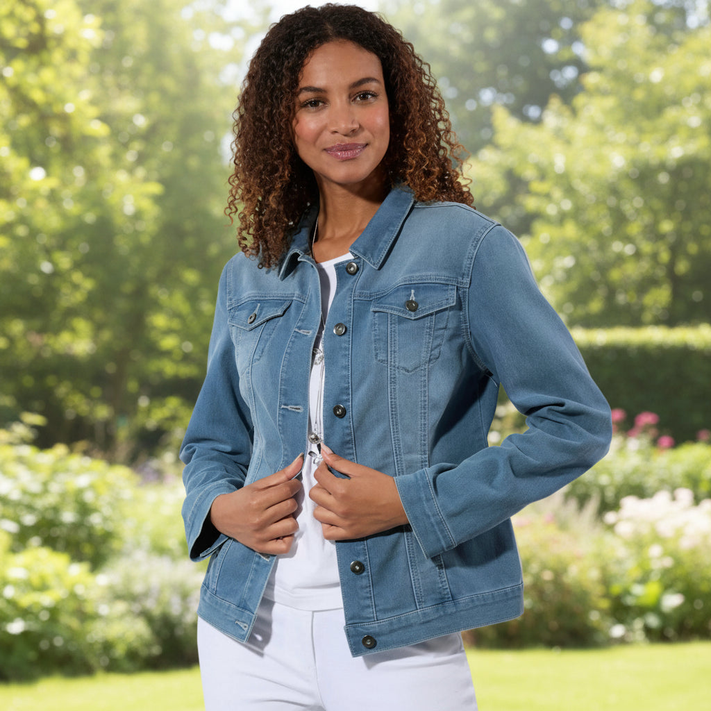 Woman wearing a blue denim jacket on a white background